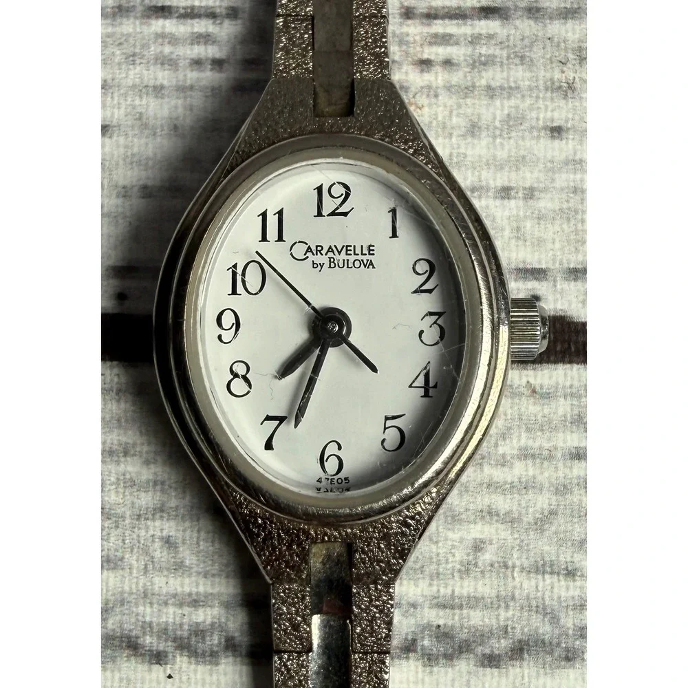 Caravelle by Bulova Womens Watch Silver Tone Oval‎ White Dial Quartz